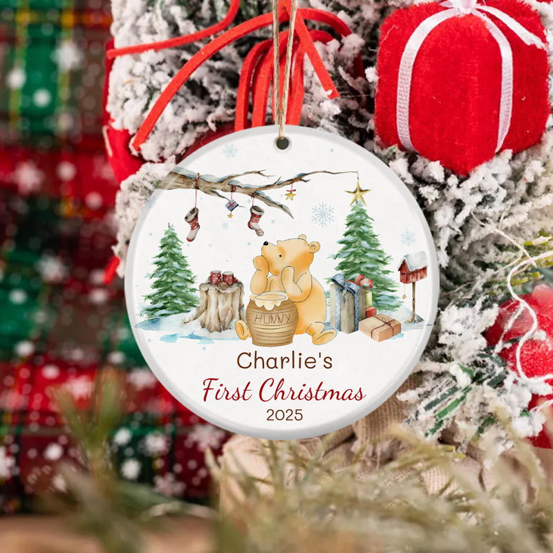 Winnie the Pooh baby's first Christmas ornament 2025. Watercolor design with Pooh, holiday trees, and gifts. Customizable for baby’s first holiday, a sweet seasonal keepsake.
