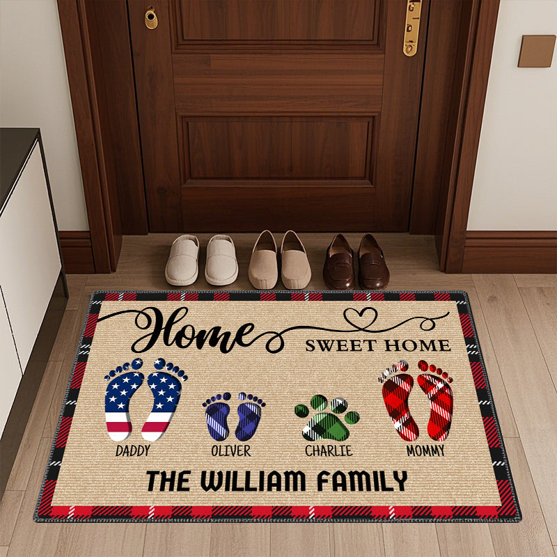 Customizable family doormat featuring "Home Sweet Home" and personalized footprints. Add your family name (like The William Family), choose 3-11 footprints, 5 colors, and input names for each.