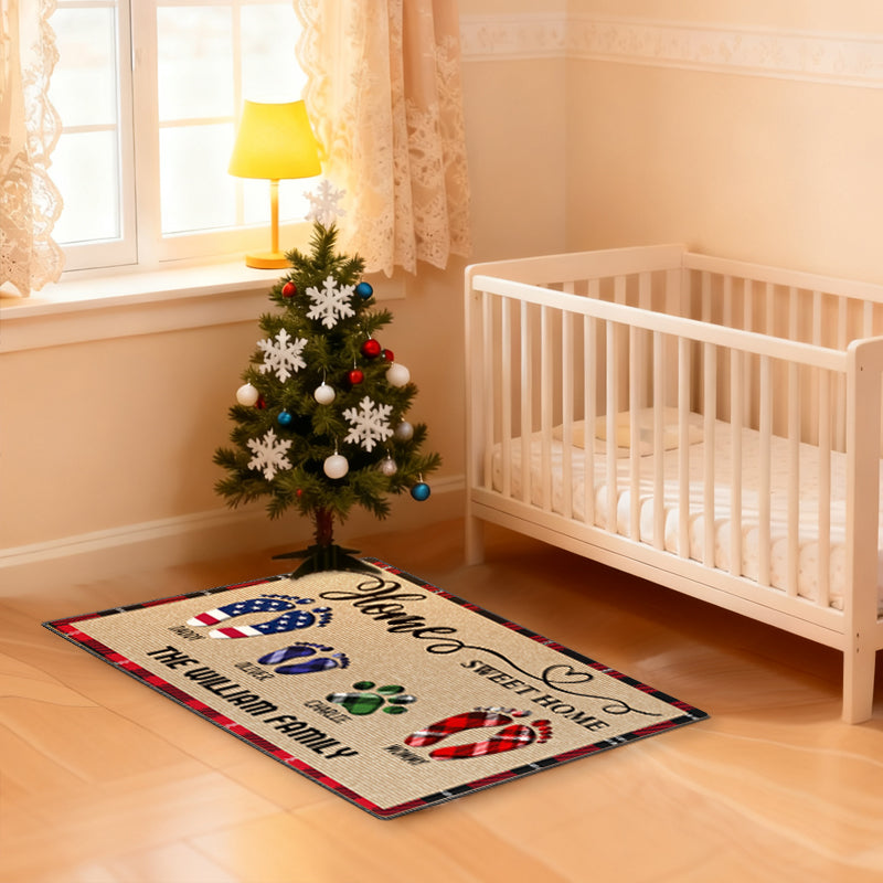 Custom family doormat with "Home Sweet Home" design. Personalize with your family name (such as The William Family), 3-11 footprints, 5 color options, and individual names.