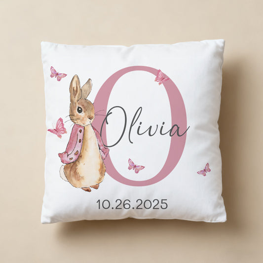 Heartfelt custom baby pillow with Peter Rabbit design, personalized with name and date—an adorable, sentimental addition to any nursery, perfect for celebrating your little one’s arrival.