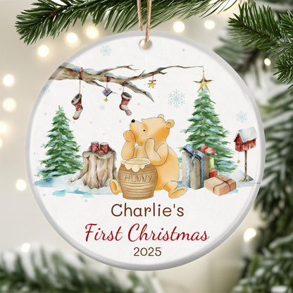 Custom Winnie the Pooh Christmas ornament for baby's first Christmas 2025. Features classic Pooh with hunny pot, winter scene, and personalized name space. Perfect holiday keepsake for new families.