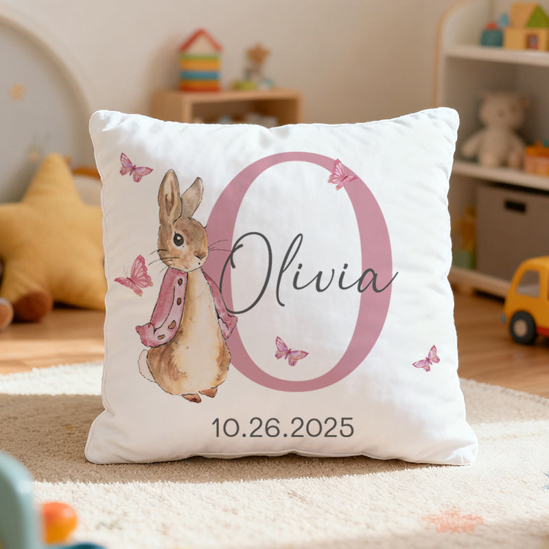 Customizable baby pillow with beloved Peter Rabbit design, personalized with name and date, creating a cozy, sentimental piece for your baby’s nursery that celebrates their unique story.